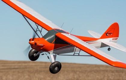 Large Field and Club representative airplane flying